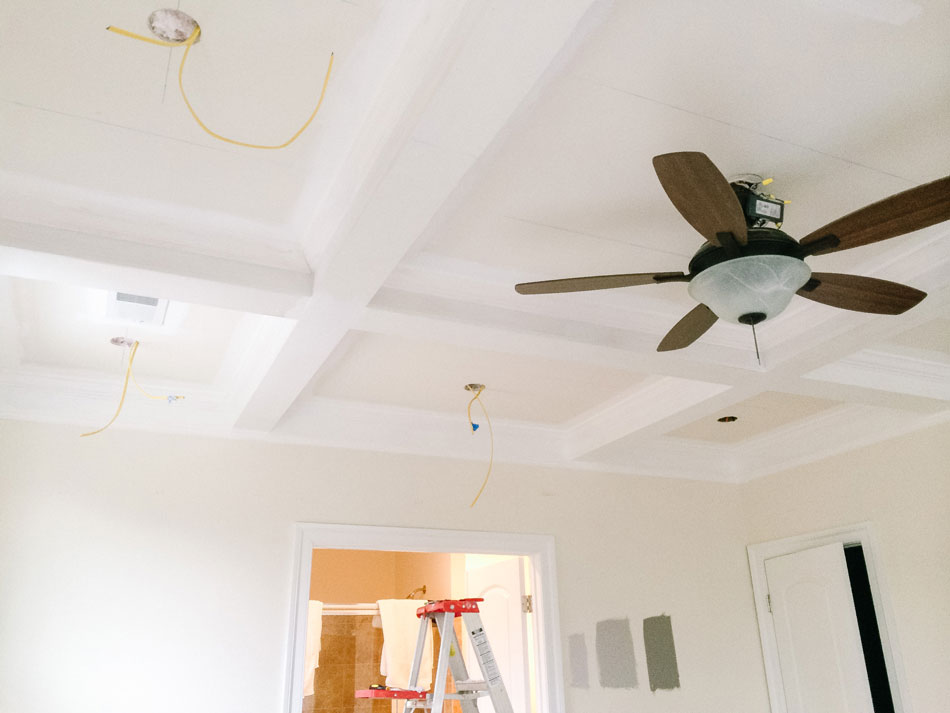 first coat of paint applied to the coffered ceiling trim