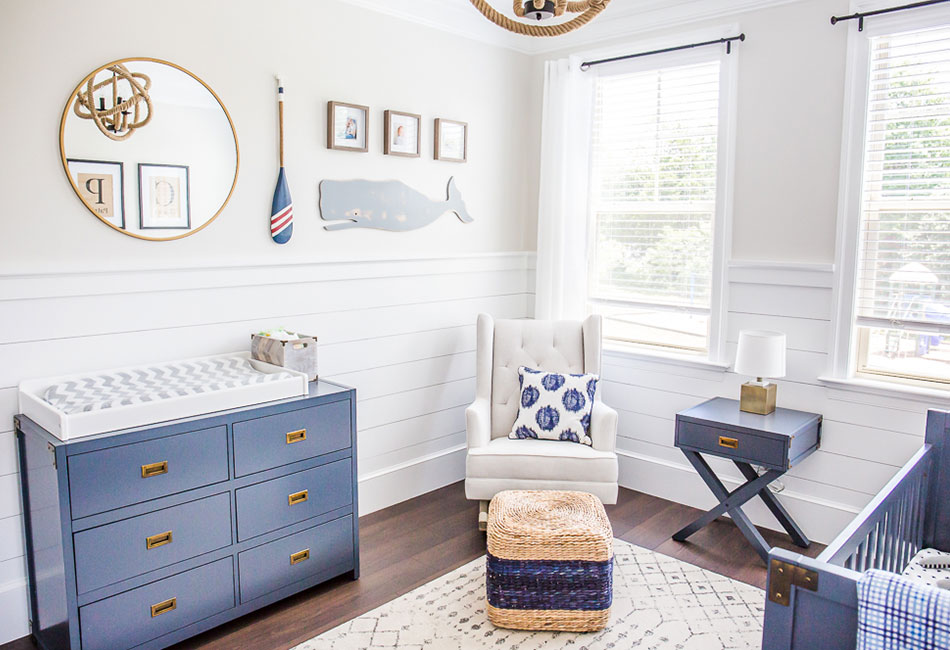 Nautical nursery featuring shiplap and brass accents