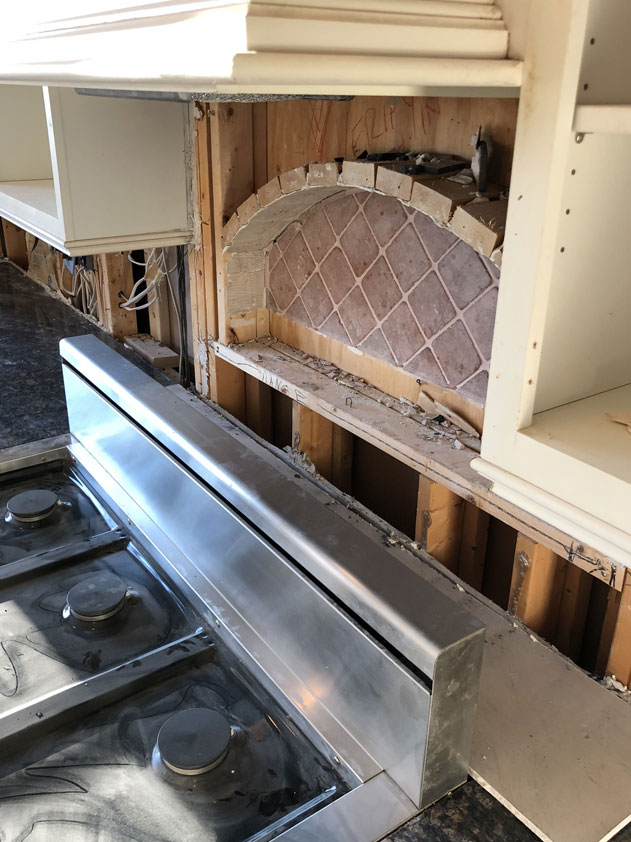 Removal of the old black tile backsplash