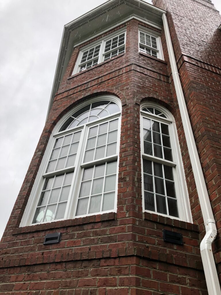 The old wood windows at The Arched Manor