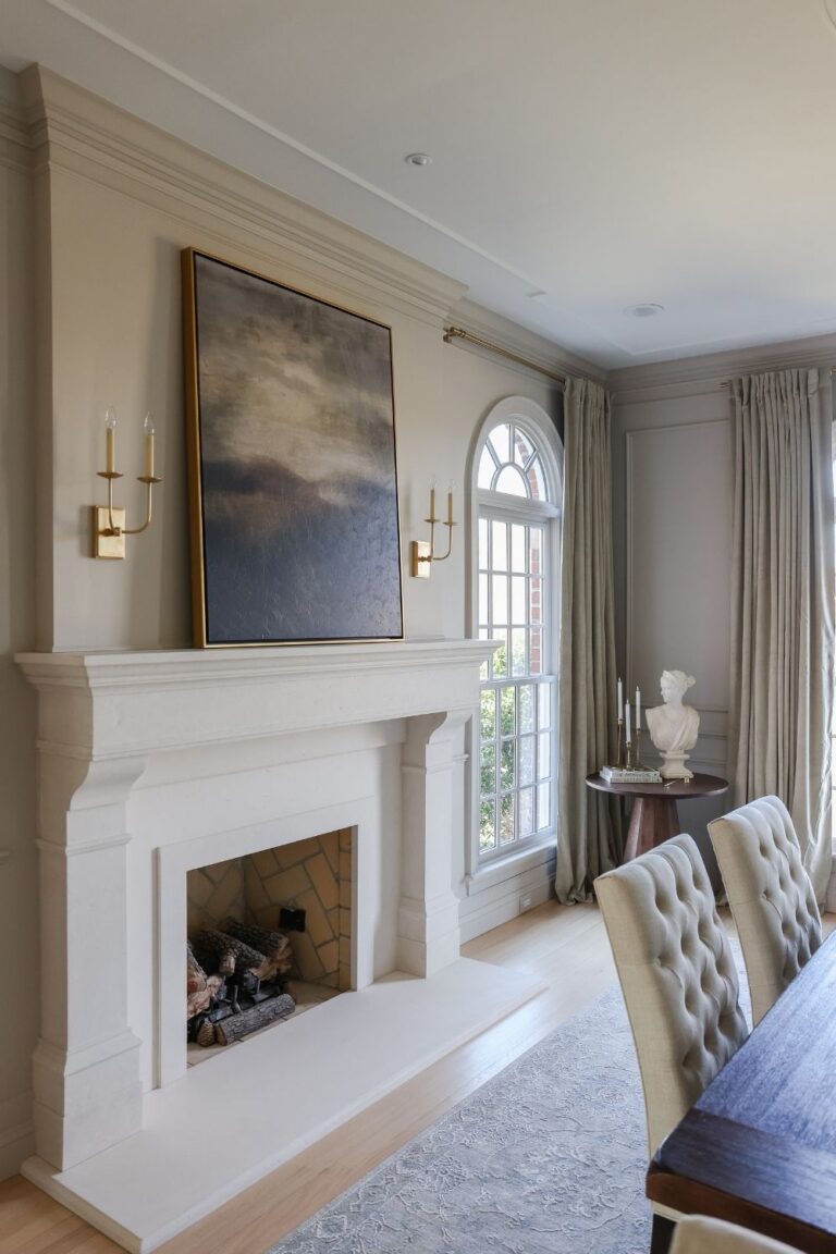 Brass sconces in dining room
