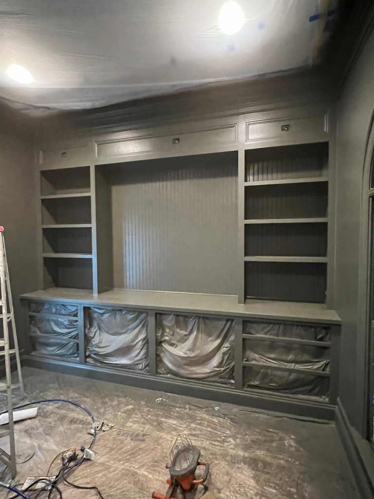 Office Built-in Shelves in our home office! Primer applied to cabinets.