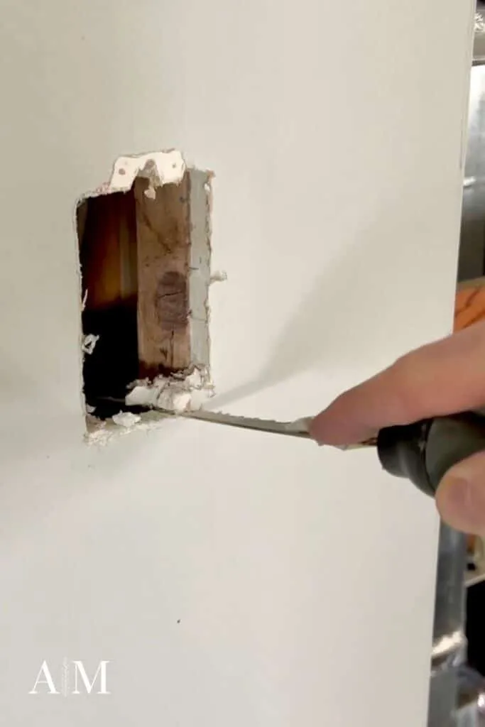 Cleaning drywall hole edges