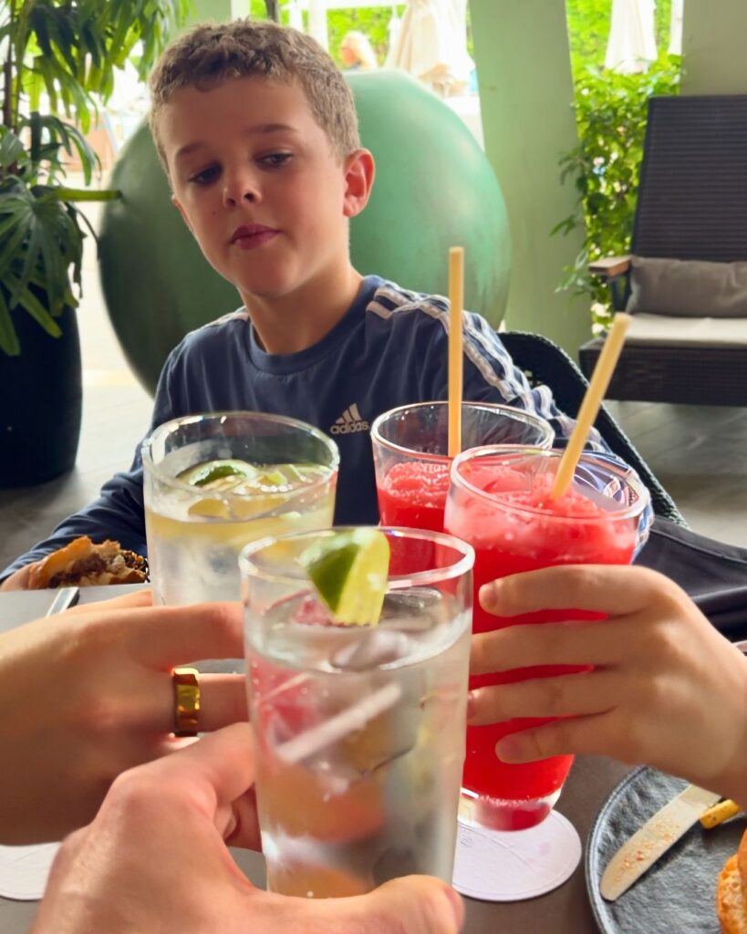 A "vacation" cheers with cold drinks for lunch at The Grill.