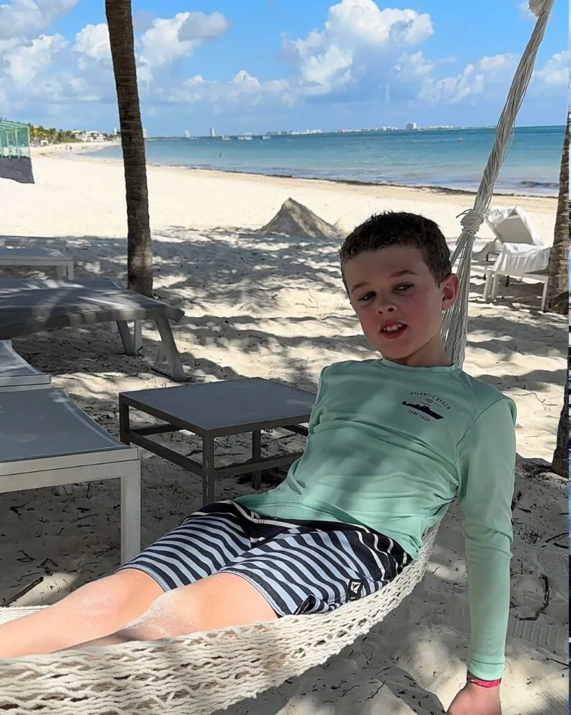 Tristan relaxing in the hammocks on the beach.