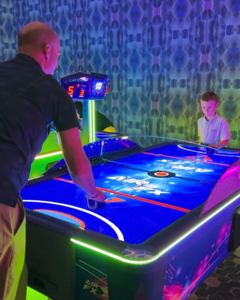 Nobody defeats the air hockey champion of the world - sorry Charlie!